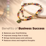 Colorful beaded bracelet on a white surface with text about business success benefits.