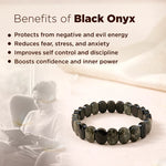 Black onyx bracelet with text listing benefits on a soft background