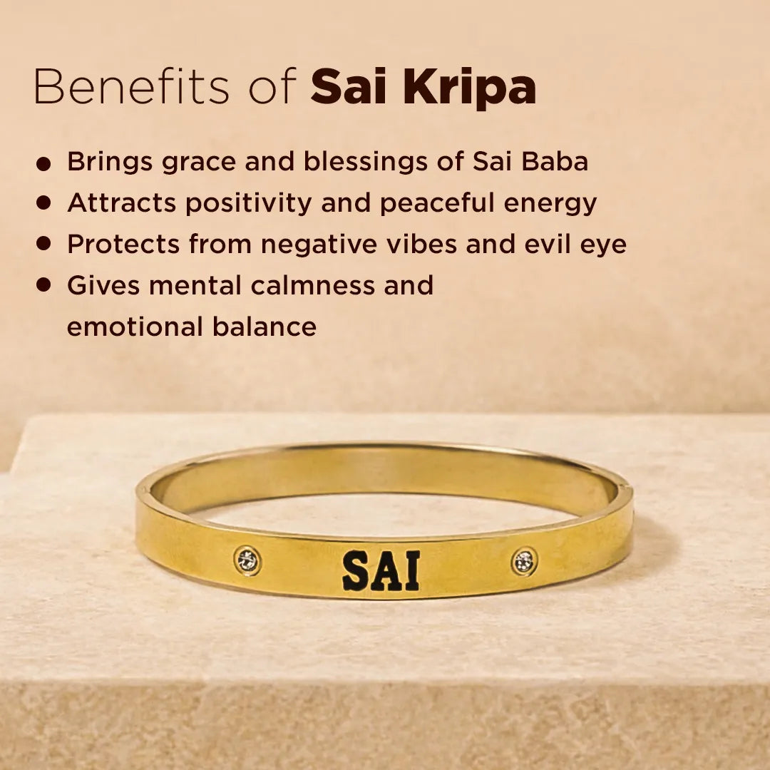 Gold bracelet with 'SAI' engraving on a beige background with text about Sai Kripa benefits.Sai Kripa Kada – IGP Gold Plated Abhimantrit Kada for Blessings, Peace & Protection