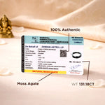 Certification label for a moss agate stone on a soft fabric background