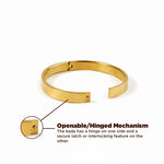 Gold bracelet with openable/hinged mechanism on a white background
