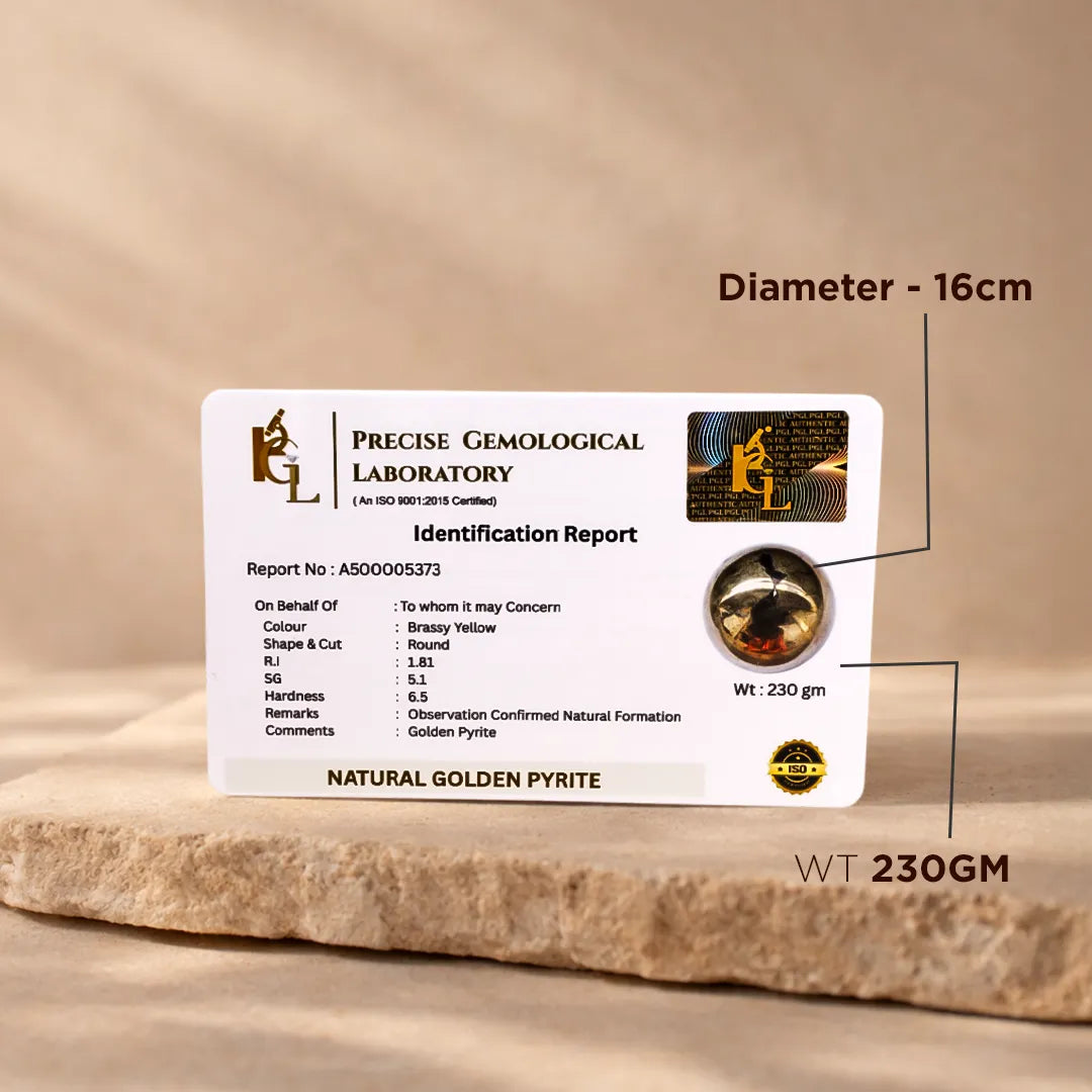 Precise Gemological Laboratory identification report for a natural golden pyrite stone on a beige background.