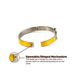 Yellow and silver kada with openable/hinged mechanism on a white background
