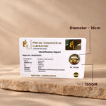 Identification report card for a natural labradorite stone with lab details on a wooden surface.