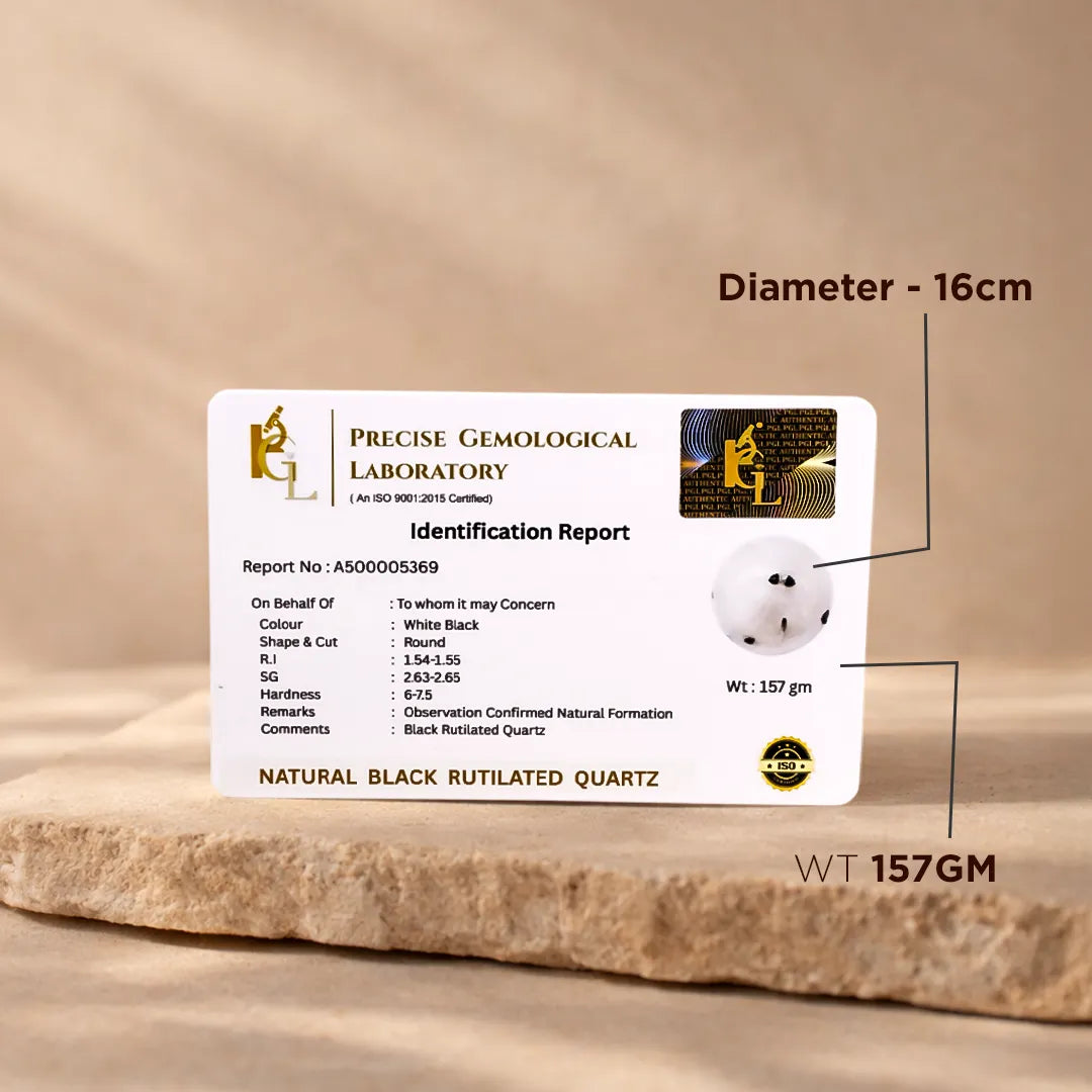 Identification report card for a natural black rutilated quartz stone on a beige backgroundNatural Black Rutilated Quartz Crystal Ball – Abhimantrit & Certified