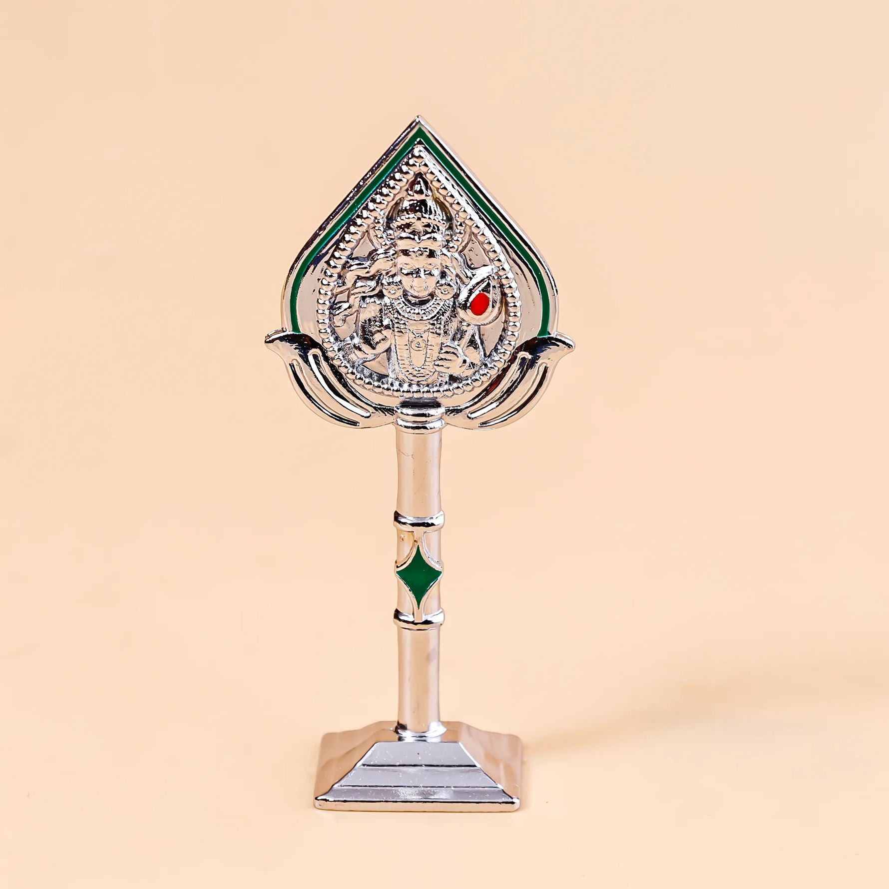 Decorative item with a figure on a stand against a beige backgroundMurugan Face Mina – Divine Blessings & Protection | Abhimantrit & Certified