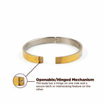 Metallic bracelet with openable/hinged mechanism on a white background