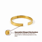 Gold bracelet with openable/hinged mechanism on a white background