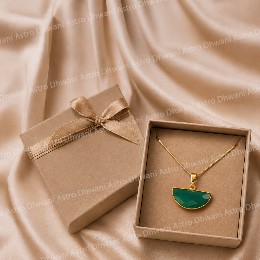 Gold necklace with a green pendant in an open box on a beige fabric backgroundHalf Moon Green Onyx Aura Pendant in Real 24KT Gold Electroformed