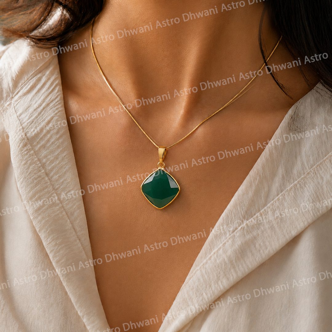 Gold necklace with a green pendant worn by a person in a white outfit.Green Onyx Aura Pendant with Cushion Shape in Real 24KT Gold Electroformed