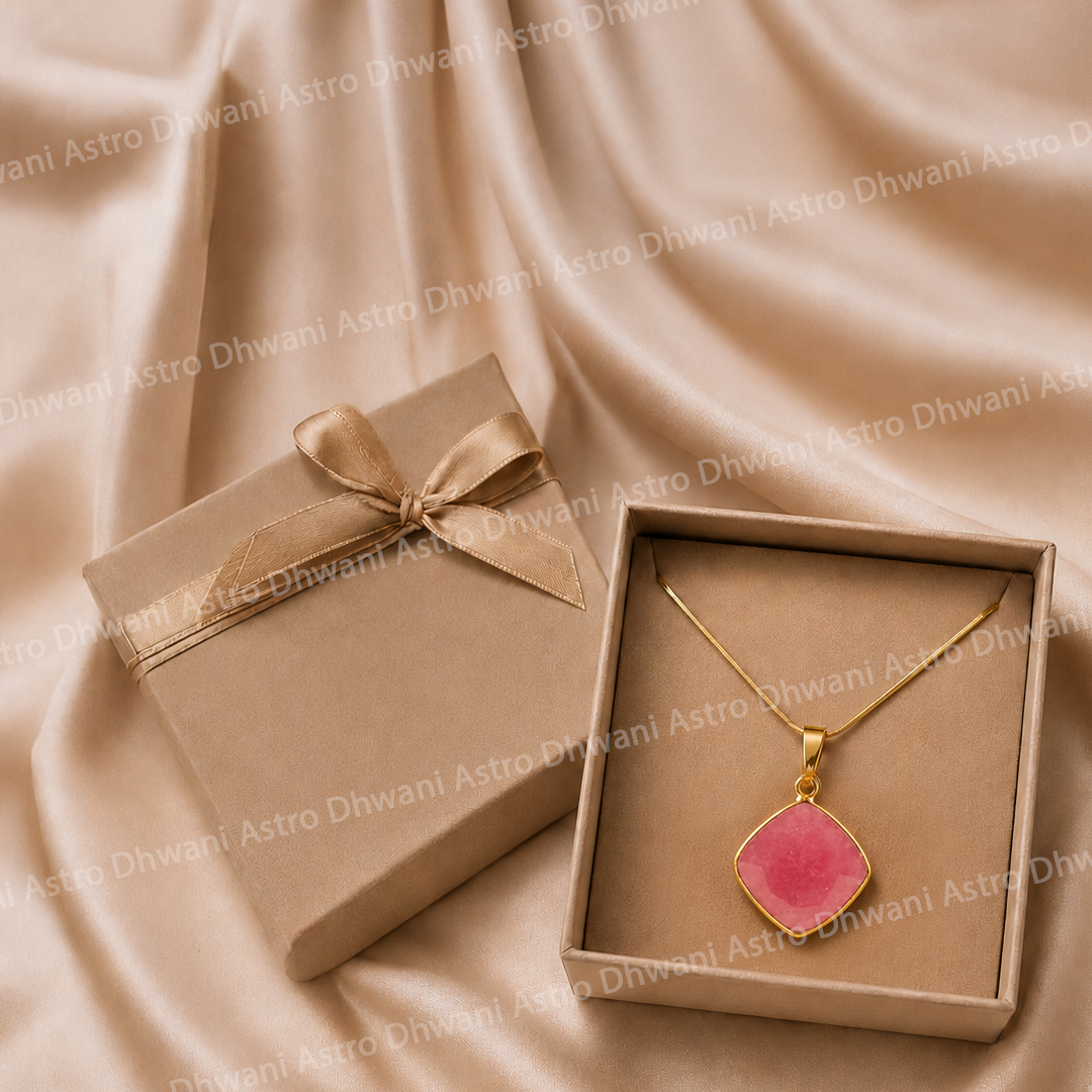 Gold necklace with a pink pendant in an open box on a beige fabric backgroundRubellite Aura Pendant with Cushion Shape in Real 24KT Gold Electroformed