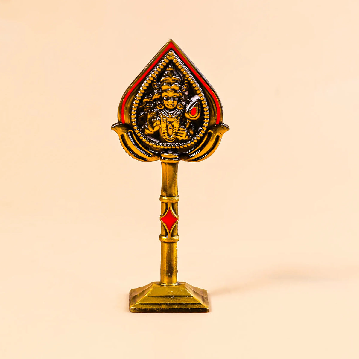 Decorative object with a central figure on a beige background