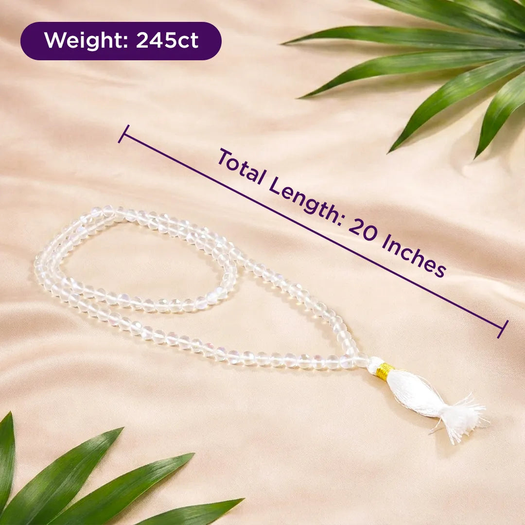 White beaded necklace with tassel on a beige background with green leaves, showing weight and length measurements.Aura Quartz Necklace for Positivity, Aura Cleansing & Confidence