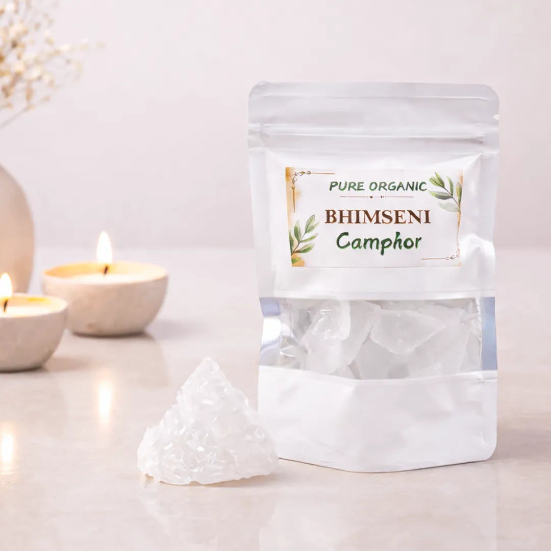 Bag of Bhimseni Camphor with candles in the backgroundBhimseni Camphor – Pure Organic Camphor for Pooja & Energy Cleansing