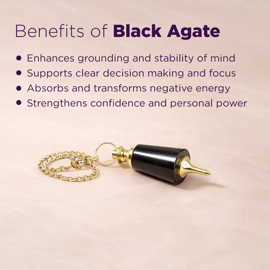 Black agate pendant with gold chain on a beige background, featuring benefits of black agate.