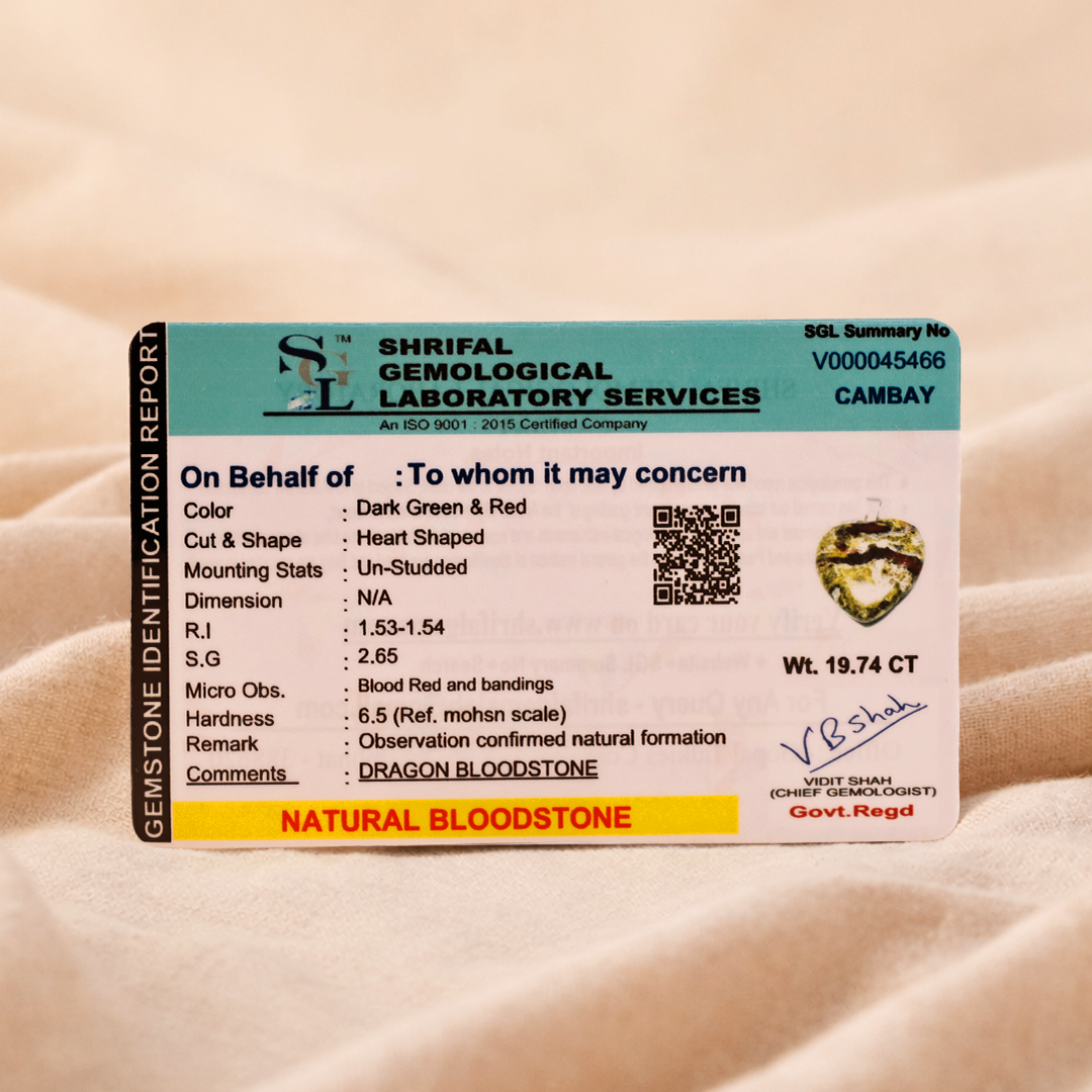 Shrilal Gemological Laboratory Services identification report for a gemstone on a beige background