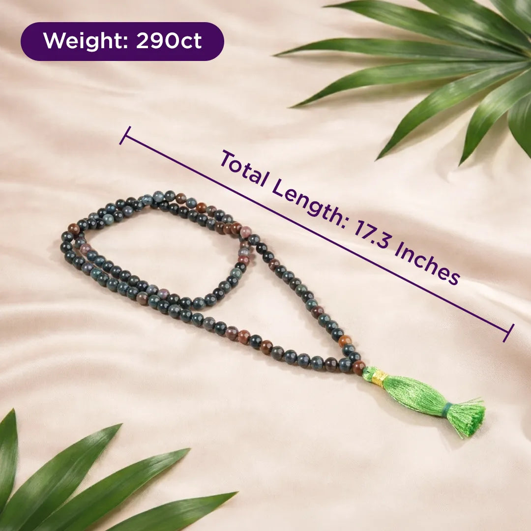 Mala necklace with measurement details on a beige background with leavesBloodstone Necklace for Strength, Protection & Confidence