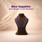 Blue Sapphire Oval Beads 3 Line Necklace on a mannequin bust with a soft beige background