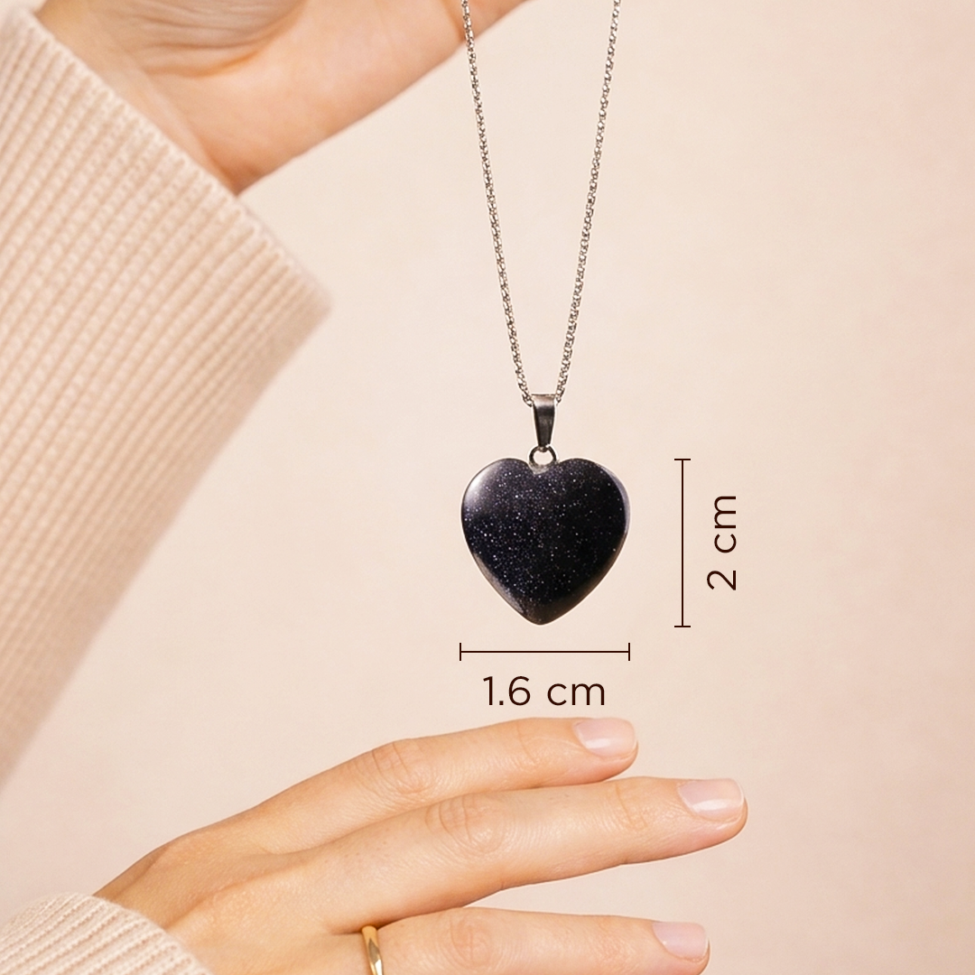 Heart-shaped pendant necklace with measurements on a beige backgroundBlue Sunstone Heart Pendant (Abhimantrit) for Confidence & Positivity