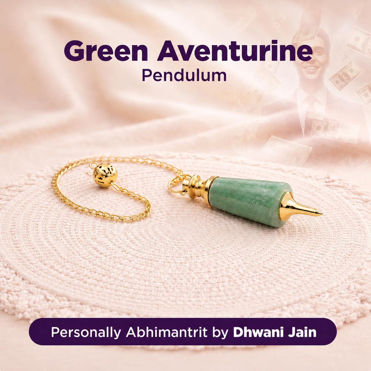 Green aventurine pendulum with gold chain on a soft fabric background