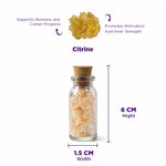 Glass bottle with citrine crystals, labeled with properties and dimensions on a white background