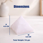 White pillow with dimensions and weight information on a neutral background
