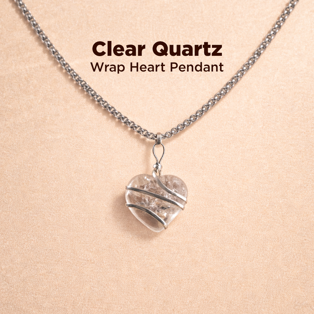 Clear Quartz Wrap Heart Pendant on a beige background