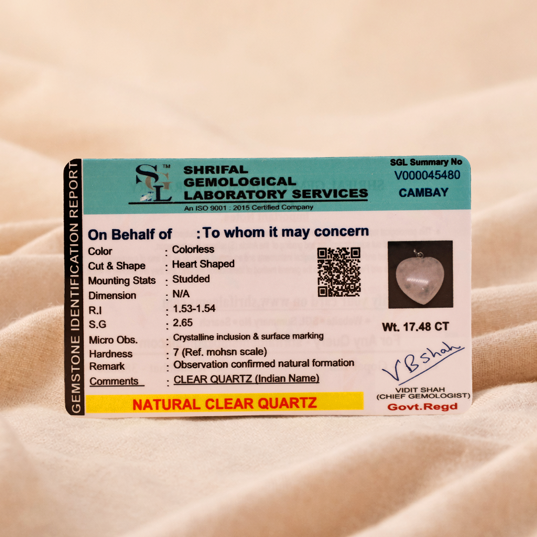 Shriful Gemological Laboratory Services identification card for a natural clear quartz stone on a beige background.Clear Quartz Heart Pendant (Abhimantrit) for Clarity & Healing