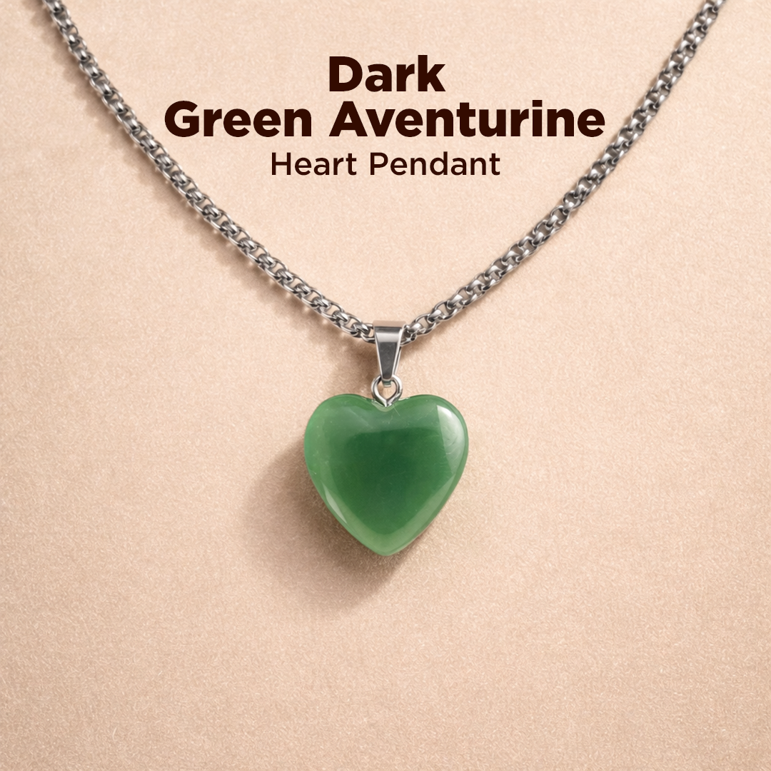 Dark Green Aventurine heart pendant on a chain against a beige background