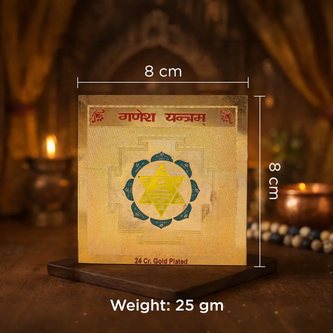 Gold-plated item with measurements and weight displayed on a wooden stand.Ganesh Yantra – 24K Gold Plated Vighnaharta Ganpati Yantra for Success & Protection