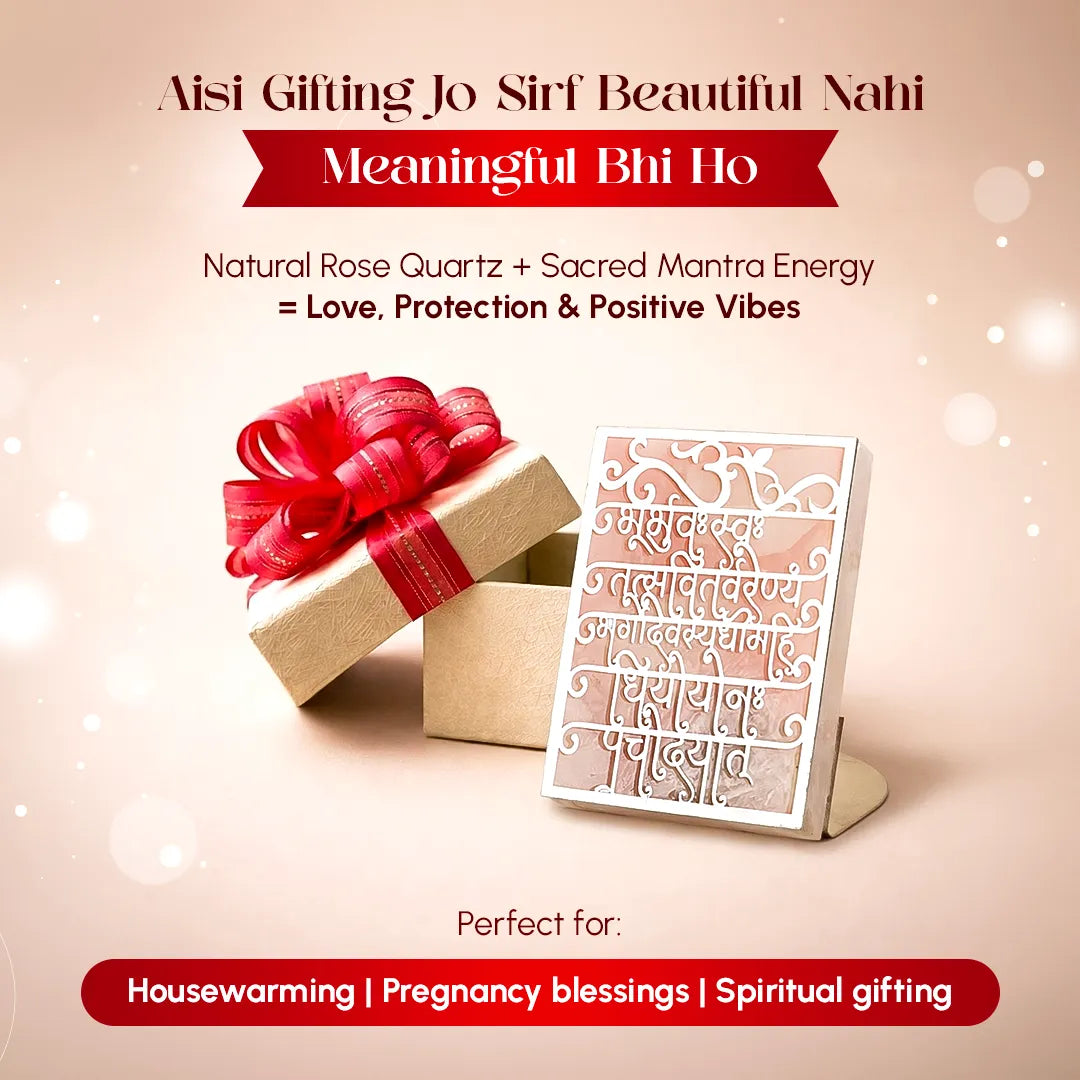 Gift box with red ribbon and card on a beige background with text about rose quartz and sacred mantra energy.Gayatri Mantra Rose Quartz Candle Stand for Peace & Spiritual Growth