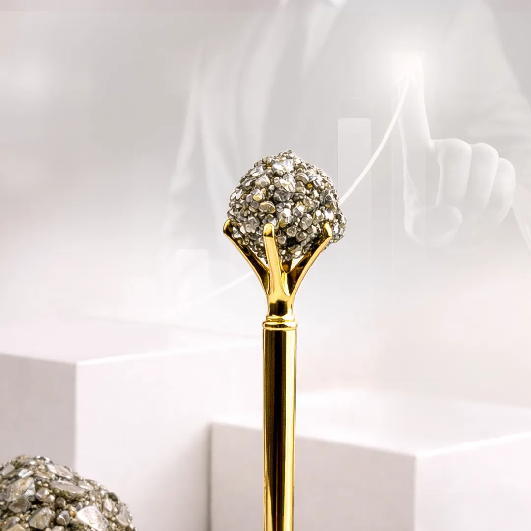 Gold and silver decorative item on a white background