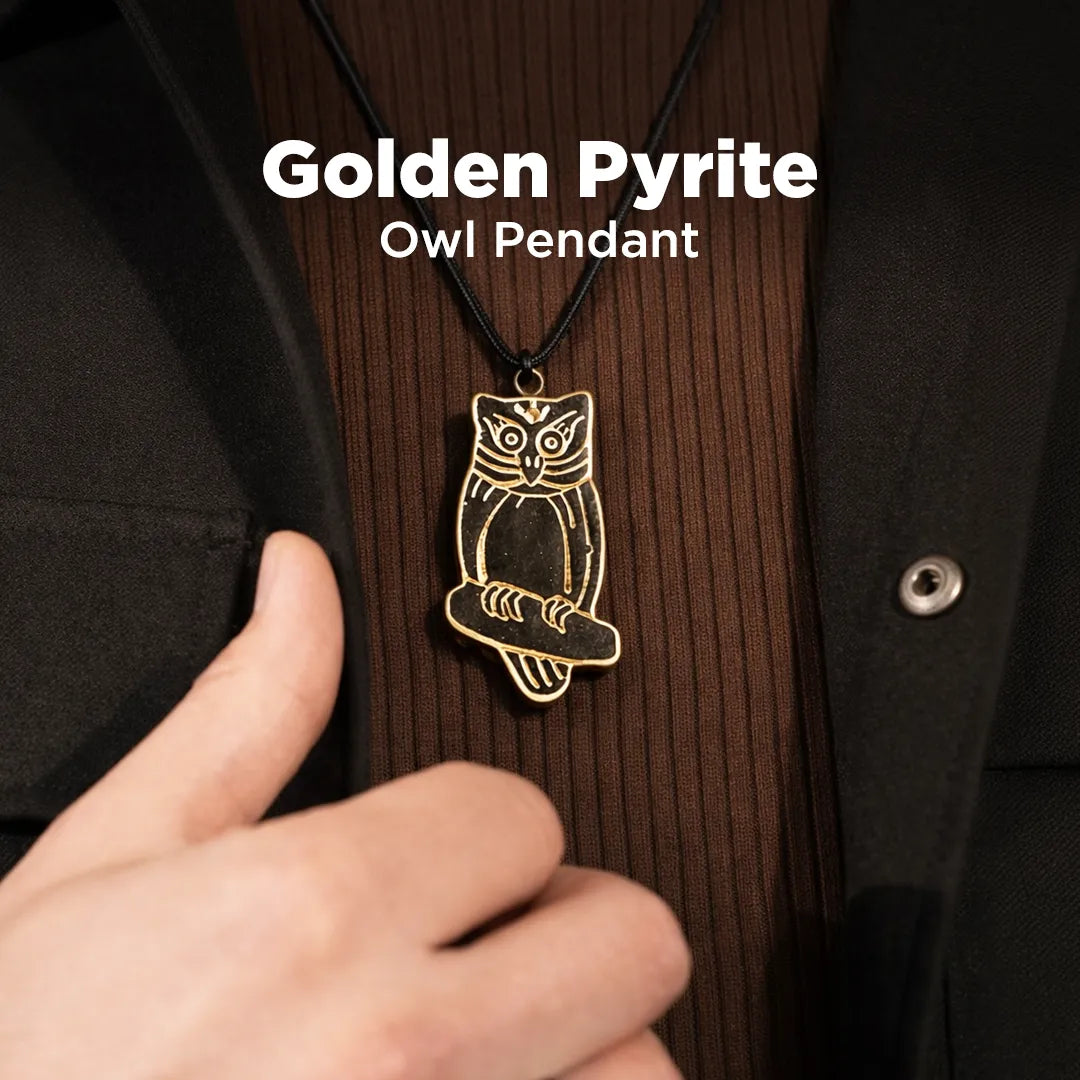 Gold owl pendant on a black cord worn by a person, with text 'Golden Pyrite Owl Pendant' above.