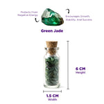 Green jade crystal in a glass bottle with measurements and properties on a white background