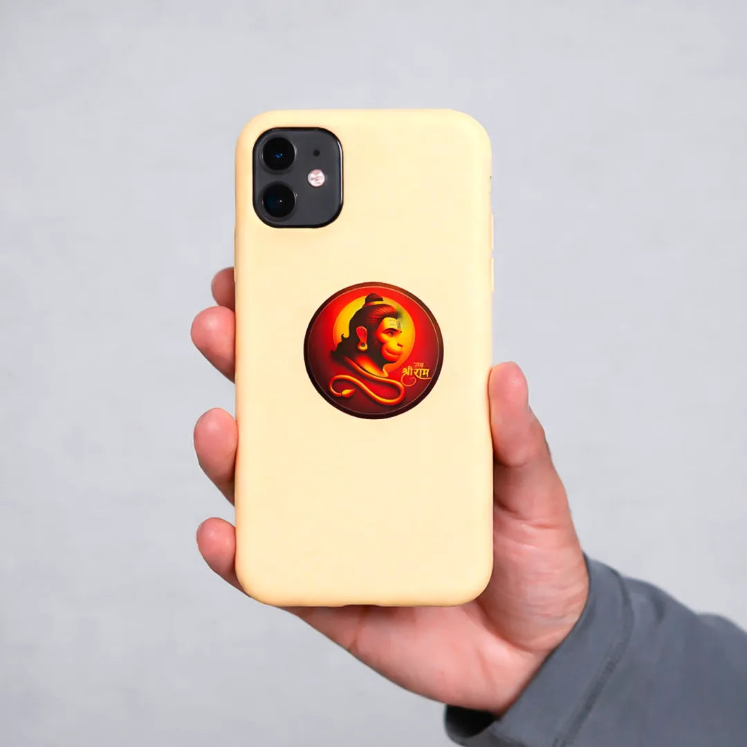 Hand holding a yellow phone case with a red and orange logo on a gray backgroundHanuman Ji Sticker (Pack of 10pcs) - Bajrangbali Protection