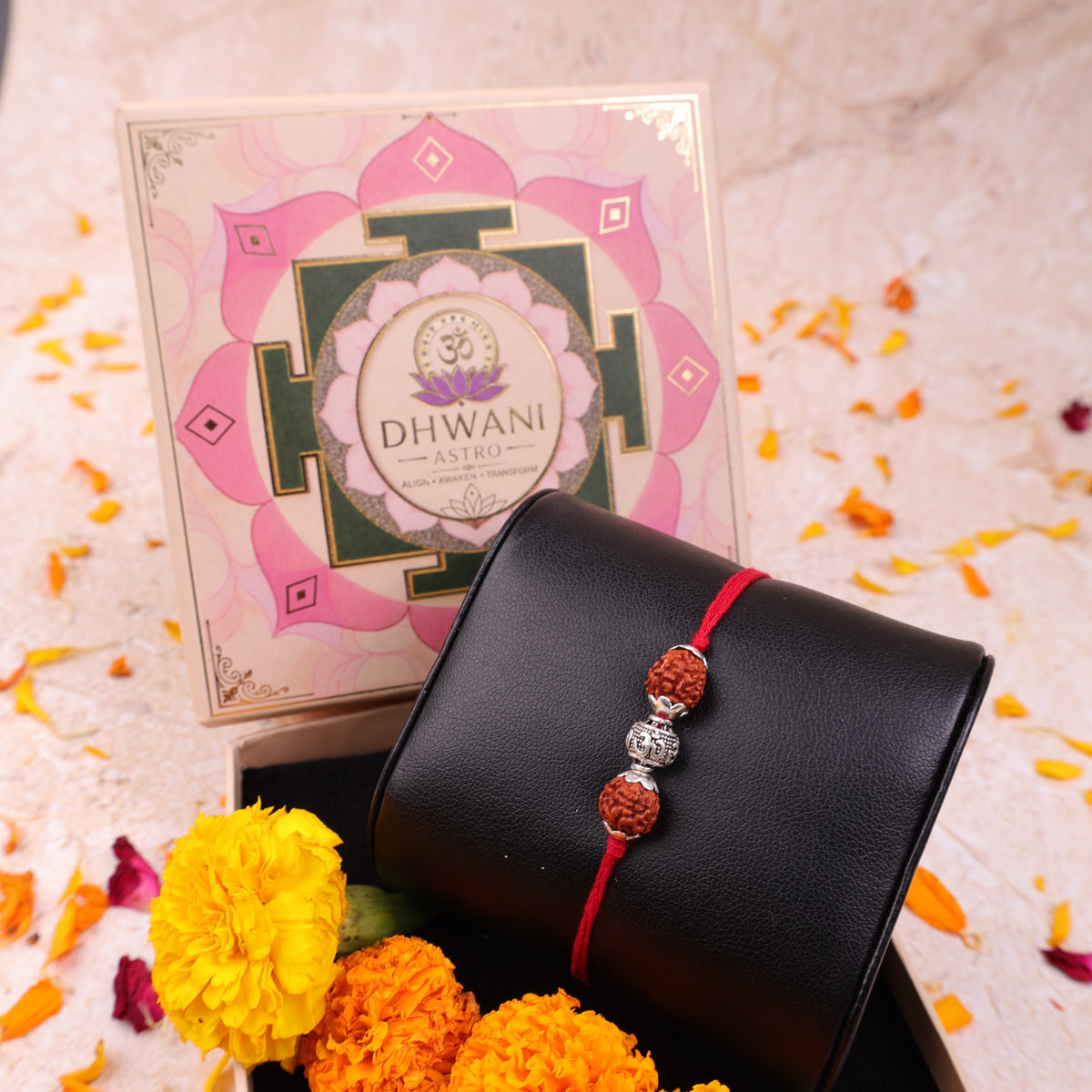 Sacred Om Rakhi crafted from 925 Sterling Silver and authentic 5 Mukhi Rudraksha on adjustable red thread.