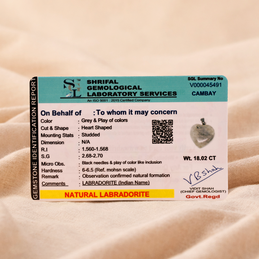 Shriful Gemological Laboratory Services identification card on a beige background