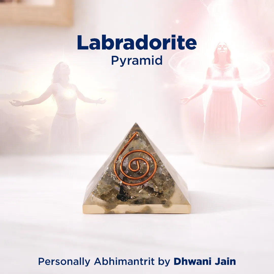 Labradorite pyramid with a spiral design on a white background, featuring the brand 'Dhwani Jain'.