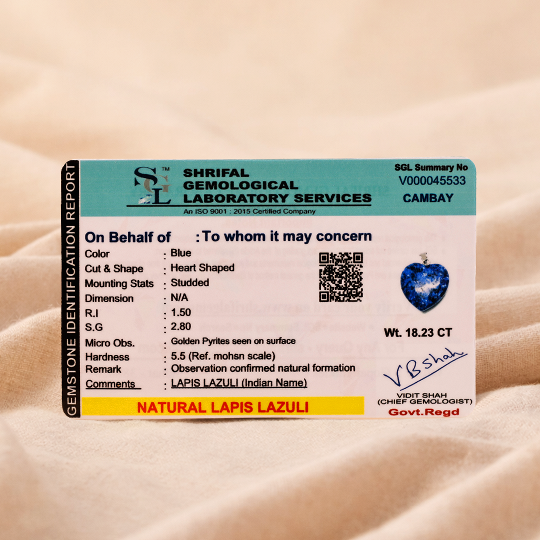 Shrilal Gemological Laboratory Services identification report for a blue heart-shaped lapiz lazuli stone on a beige background.