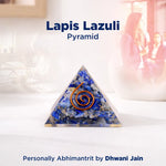 Lapis Lazuli pyramid with a spiral design on a white background