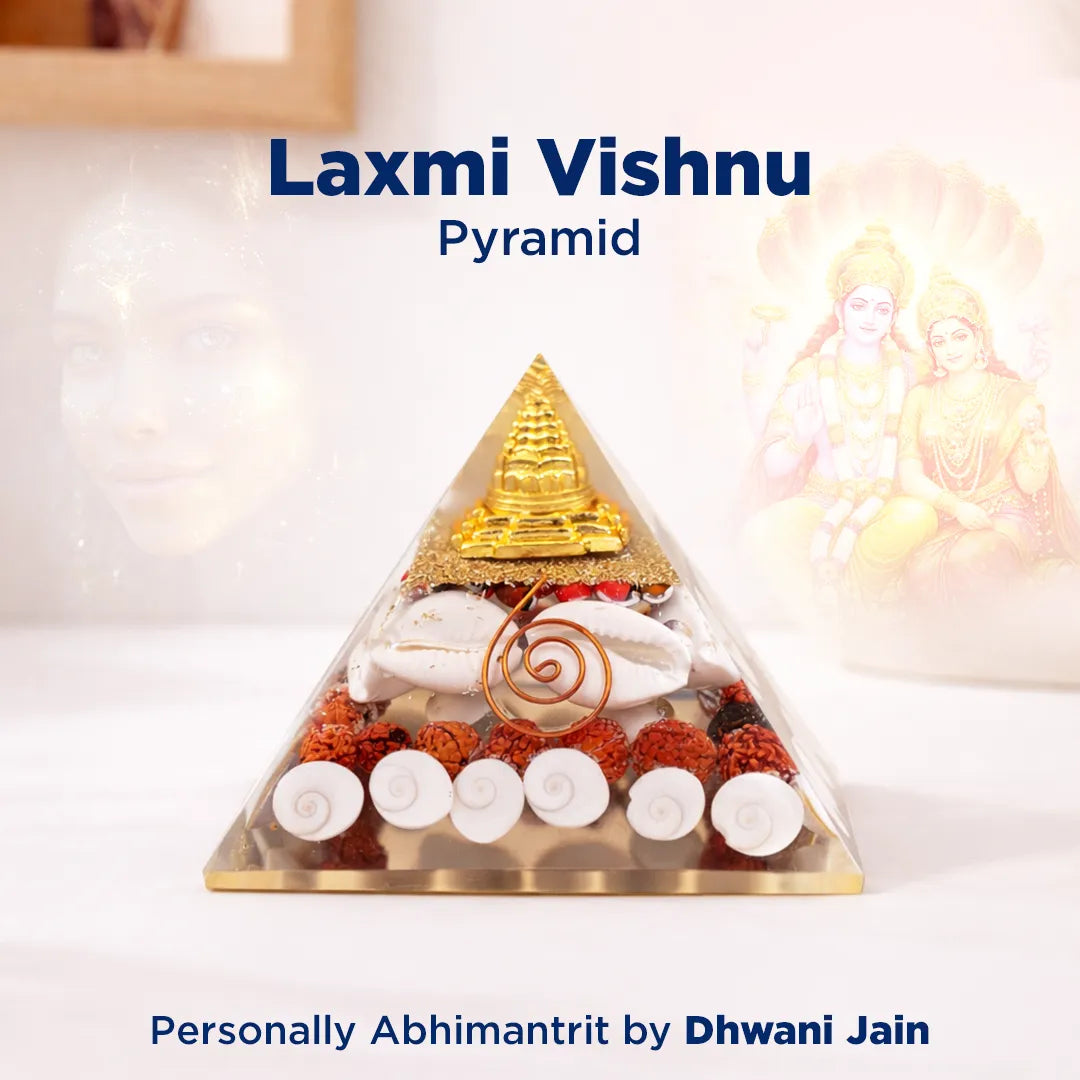 Pyramid-shaped Laxmi Vishnu item with decorative elements on a light background