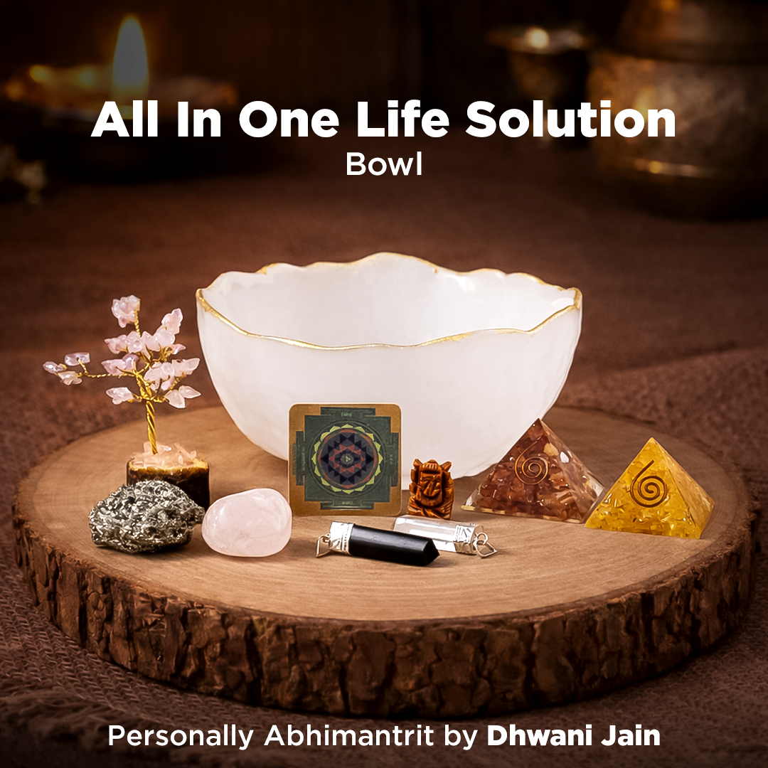 White bowl on a wooden surface with crystals and decorative items, labeled 'All In One Life Solution Bowl'.