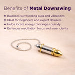 Metallic pendulum with text about the benefits of metal downswings on a beige background