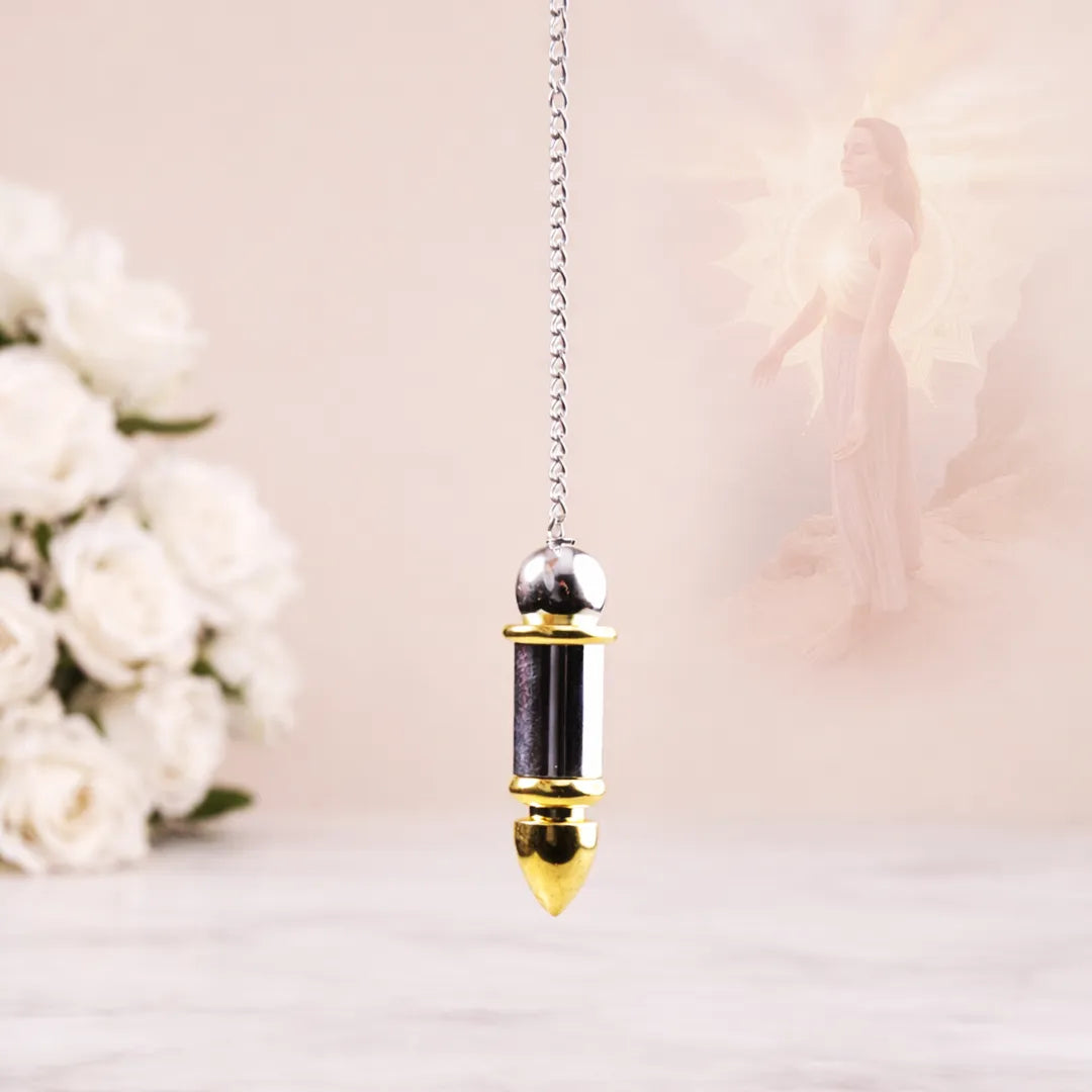 Decorative pendant with gold and silver accents on a blurred floral background