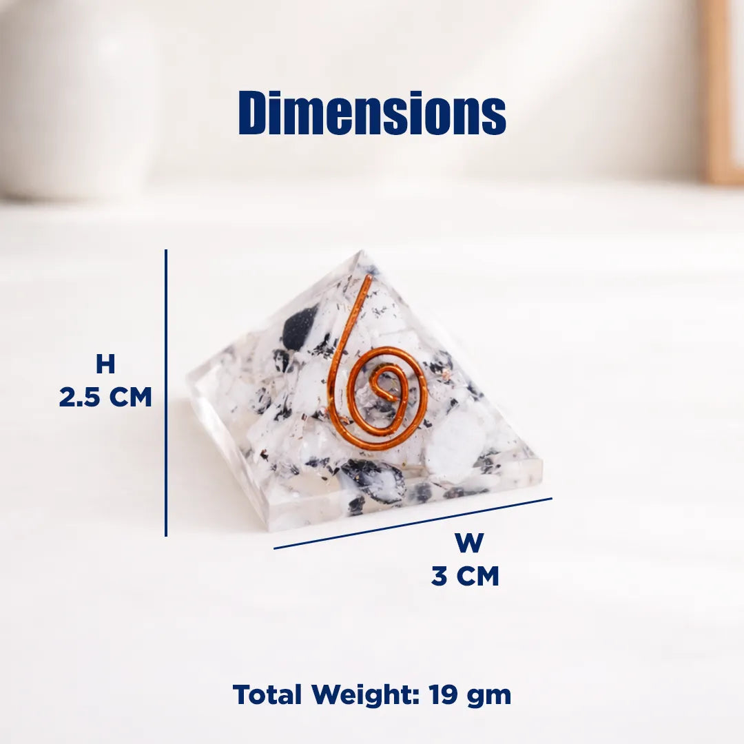 Pyramid-shaped decorative item with dimensions and weight on a white background