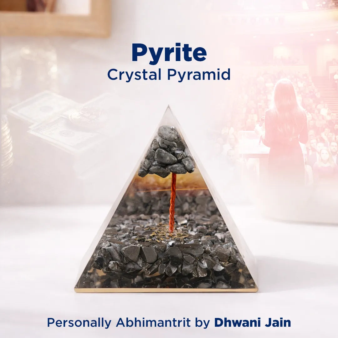 Pyrite crystal pyramid with a blurred background