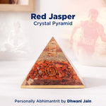 Red Jasper crystal pyramid with text about personally Abhimantrit by Dhwani Jain.