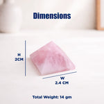 Pink crystal pyramid with dimensions and weight information on a white background