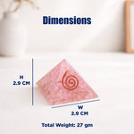 Pyramid-shaped pink stone with a spiral design on a white surface, showing dimensions and weight.