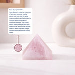 Rose Quartz pyramid with text on its benefits on a soft pink background
